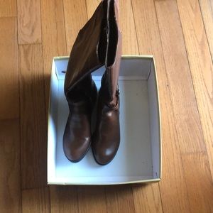 New brown color pair boots and never worn.